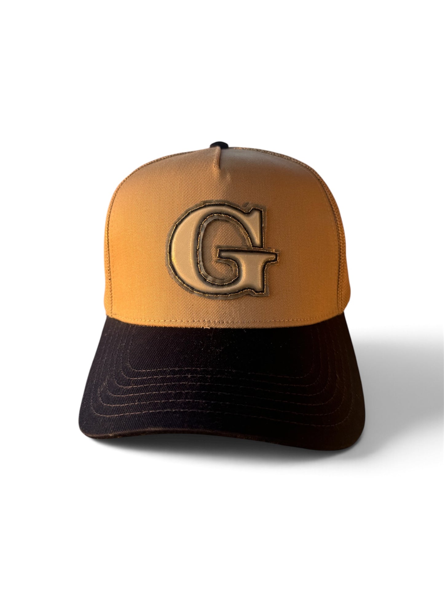 GoldMind Navy/Tan big G patch trucker hat