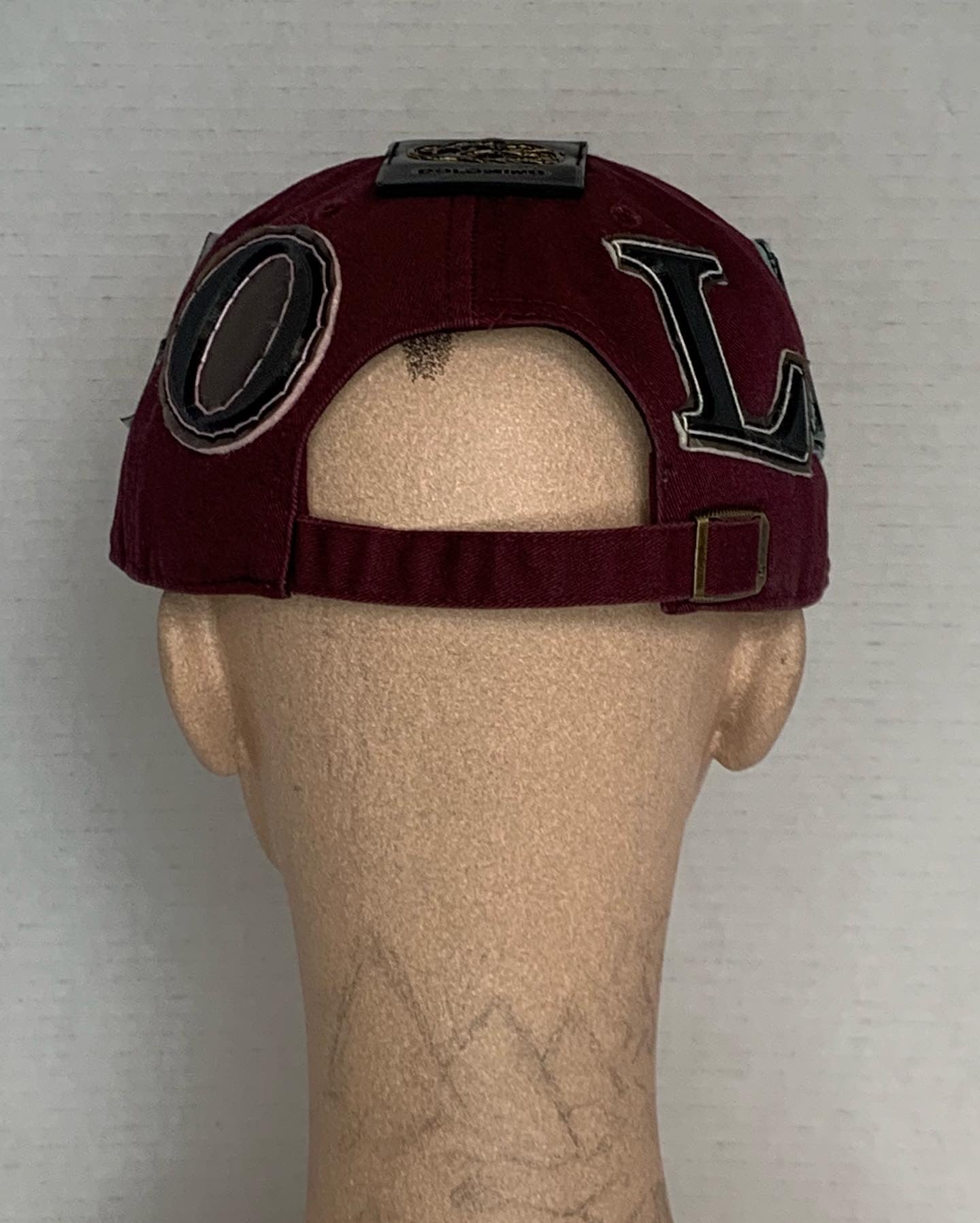 Front in the Back Gold hat in Burgandy